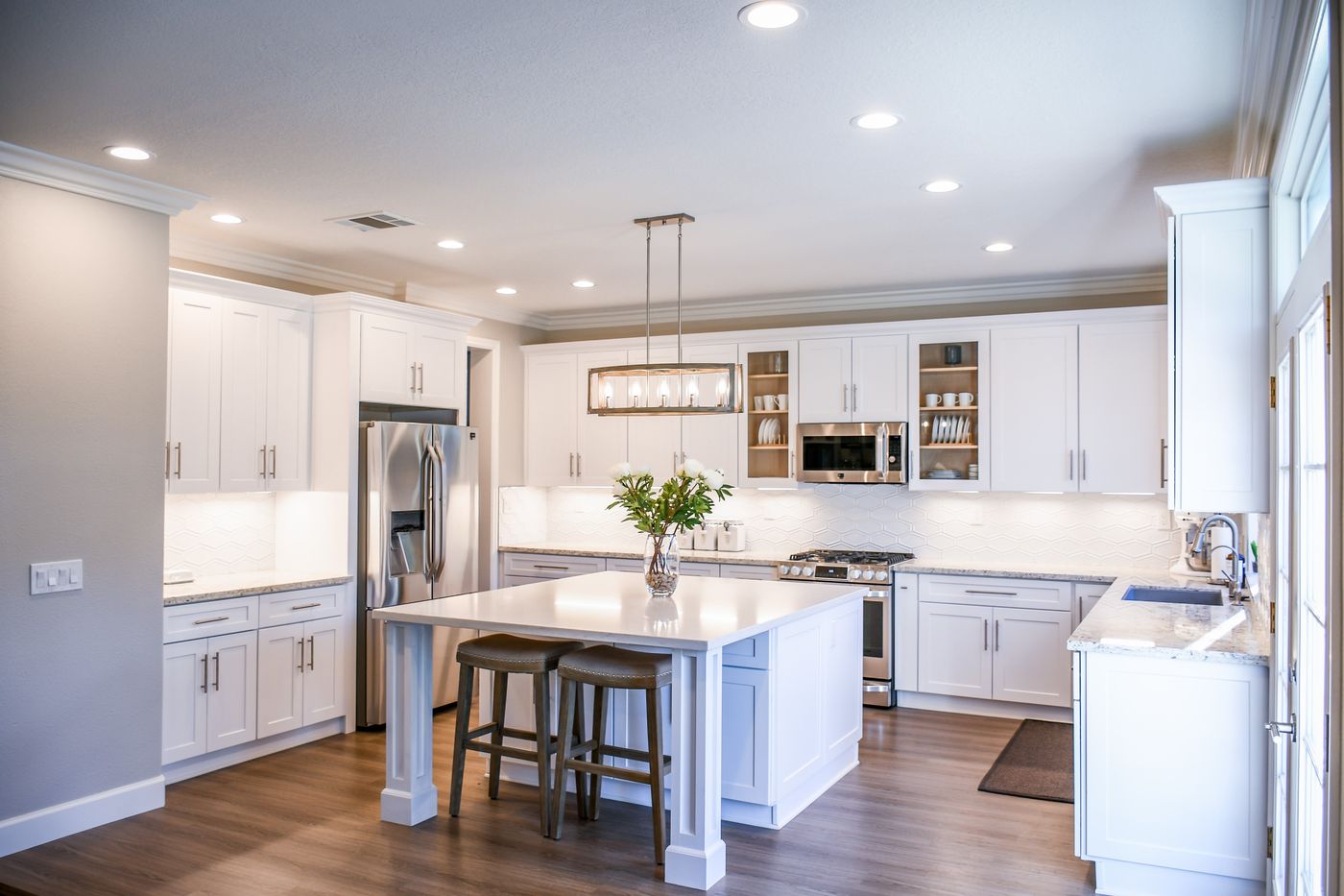 Bright modern kitchen with stainless appliances